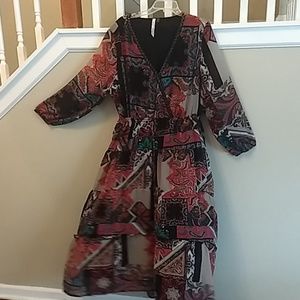 Beautiful Indonesian dress with black underlining